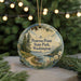 A round ornament with a scenic landscape of Penrose Point State Park, Washington, featuring pine trees, a river, and mountains.