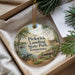 A decorative ornament with a scenic image of Pickwick Landing State Park, Tennessee, hanging from a string.