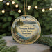 A round ornament with a scenic landscape of Pirogue Island, State Park, Montana, featuring a lake, mountains, pine trees, and a duck.
