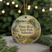 A round ornament with a scenic image of Platte River State Park, Nebraska, featuring a bird, a bridge, and a river.