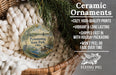 Ceramic ornaments, including a round ornament with a bird and a landscape scene, are displayed in a basket.