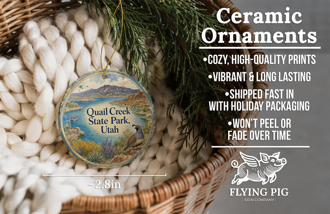 Ceramic ornaments, featuring a detailed illustration of Quail Creek State Park in Utah, are displayed in a woven basket.