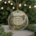 A round ornament with a scenic mountain landscape and a waterfall, featuring text that reads "Ramapo Mountain State Forest, New Jersey".