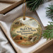 A decorative ornament with a painting of a historic site, specifically Red Clay State Historic Park in Tennessee, hanging from a string.