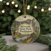A round ornament with a scenic landscape of a river, mountains, and pine trees, featuring the text "Riverside State Park, Washington".