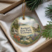 A decorative ornament with a scenic landscape of Rockport State Park, Washington, featuring a waterfall, pine trees, and a house.