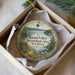 A round ornament in a box, depicting a scenic view of the Round Valley Recreation Area in New Jersey.