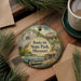 A decorative ornament featuring a vintage car and a scenic landscape, with the text "Route 66 State Park, Missouri" prominently displayed.