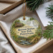 A decorative ornament with a scenic image of Ryerson Station State Park, Pennsylvania, featuring a house, a bridge, and a waterfall.