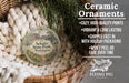 Ceramic ornaments, featuring a round ornament with a scenic landscape of Schafer State Park, Washington, hanging from a wicker basket.