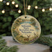 A round ornament with a scenic landscape featuring a deer, a bird, and a body of water, along with the text "Schramm State Recreation Area, Nebraska".