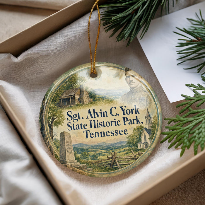 A decorative ornament with a picture of a historical site, specifically SGT. Alvin C. York State Historic Park, Tennessee, hanging from a string.