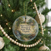 A round ornament on a Christmas tree, featuring a scenic image of Shot Tower Historical State Park, Virginia.