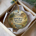 A round ornament with a scenic image of Smith River State Park, Montana, hanging from a string.