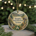 A round ornament with a scenic mountain landscape and a cabin, featuring the text "Smugglers' Notch State Park, Vermont" on it.