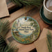 A round ornament with a lighthouse and a scenic landscape, featuring the text "South Bass Island State Park, Ohio".