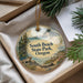 A decorative ornament with a scenic landscape of South Beach State Park, Oregon, featuring pine trees, a body of water, and a rocky shoreline.