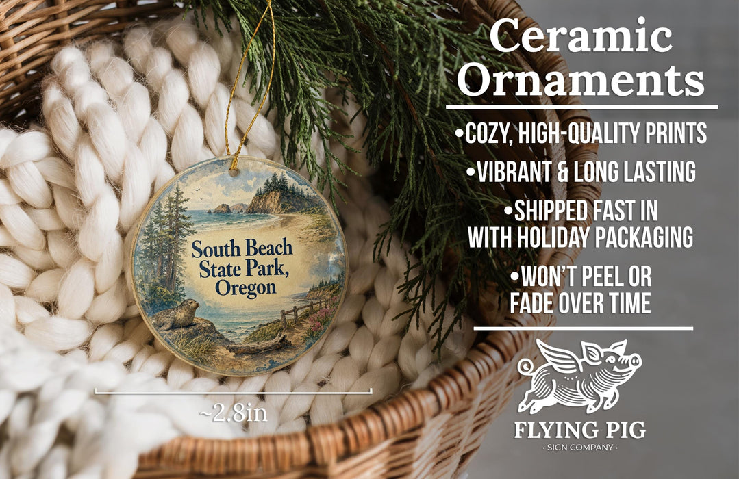 Ceramic ornaments, featuring a scenic image of South Beach State Park, Oregon, are displayed in a woven basket.