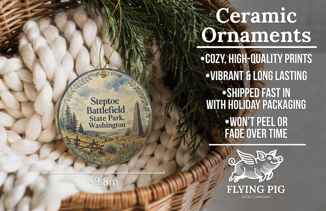 Ceramic ornaments, specifically Stepoe Battlefield State Park, Washington ornaments, are displayed in a woven basket. The ornaments are described as cozy, high-quality prints, vibrant, and long-lasting, and are shipped fast in holiday packaging. They are not to be peeled or faded over time. The image also includes a scale for the ornaments and a logo for the Flying Pig Sign Company.
