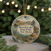 A circular ornament with a scenic landscape of Storrie Lake State Park, New Mexico, featuring a bird and a body of water.