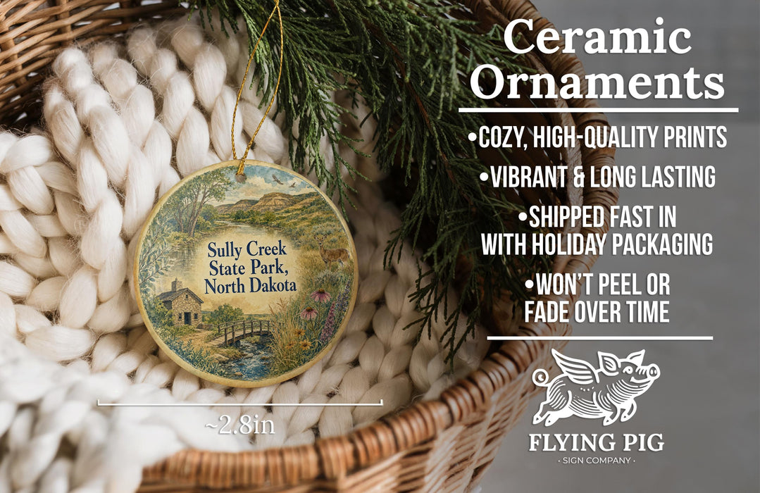 Ceramic ornaments, featuring a detailed illustration of Sully Creek State Park, North Dakota, hanging from a wicker basket.