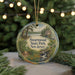 A round ornament with a scenic landscape of Swartswood State Park, New Jersey, featuring a lake, trees, and a building.