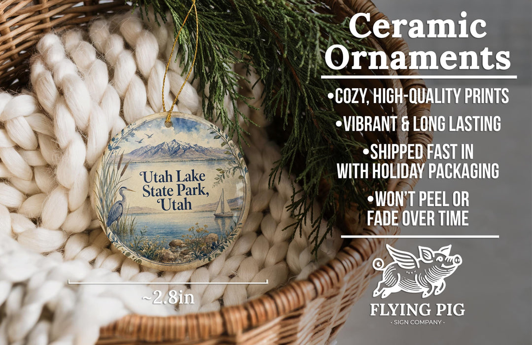 Ceramic ornaments, featuring a design of Utah Lake State Park, Utah, and a wicker basket with greenery.
