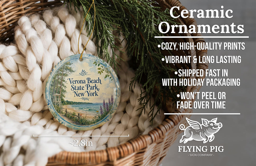 Ceramic ornaments, featuring a blue and white design with text and a bird illustration, are displayed in a basket with greenery.