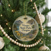 A round ornament on a Christmas tree, featuring a scenic landscape with mountains, a waterfall, and a river, with the text "Viento State Park, Oregon" displayed prominently.