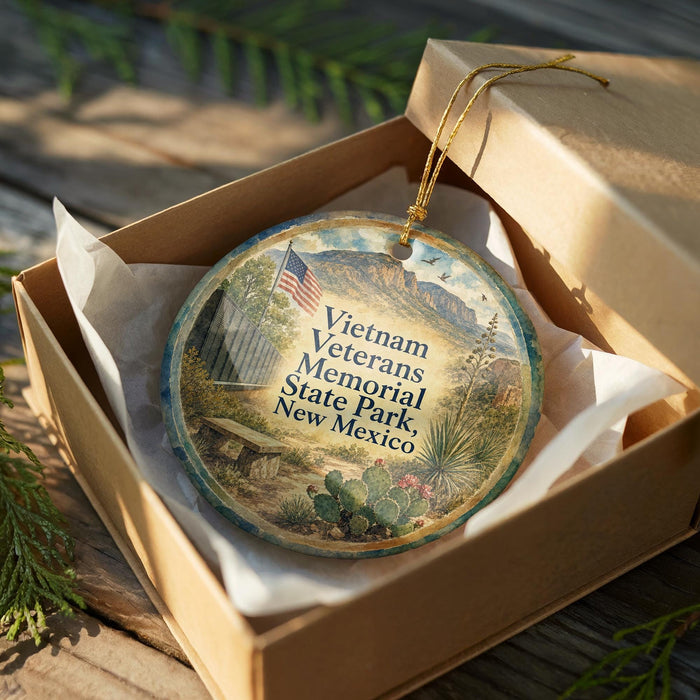 A decorative ornament in a box, featuring an image of a memorial with a Vietnamese flag and the text "Vietnam Veterans Memorial State Park, New Mexico".