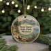 A round ornament with a scenic landscape of mountains, a lake, and pine trees, featuring the text "West Shore State Park, Montana" on it.