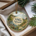 A round ornament with a scenic landscape of Wilgus State Park, Vermont, hanging from a string.