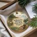 A decorative ornament with a painting of Willamette Mission State Park, Oregon, hanging from a string.