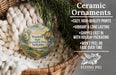 Ceramic ornaments, featuring a Windmill State Recreation Area in Nebraska ornament, are displayed in a basket with pine branches.