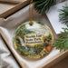 A decorative ornament with a scenic image of a waterfall and forest, featuring the text "Worlds End State Park, Pennsylvania" on it.
