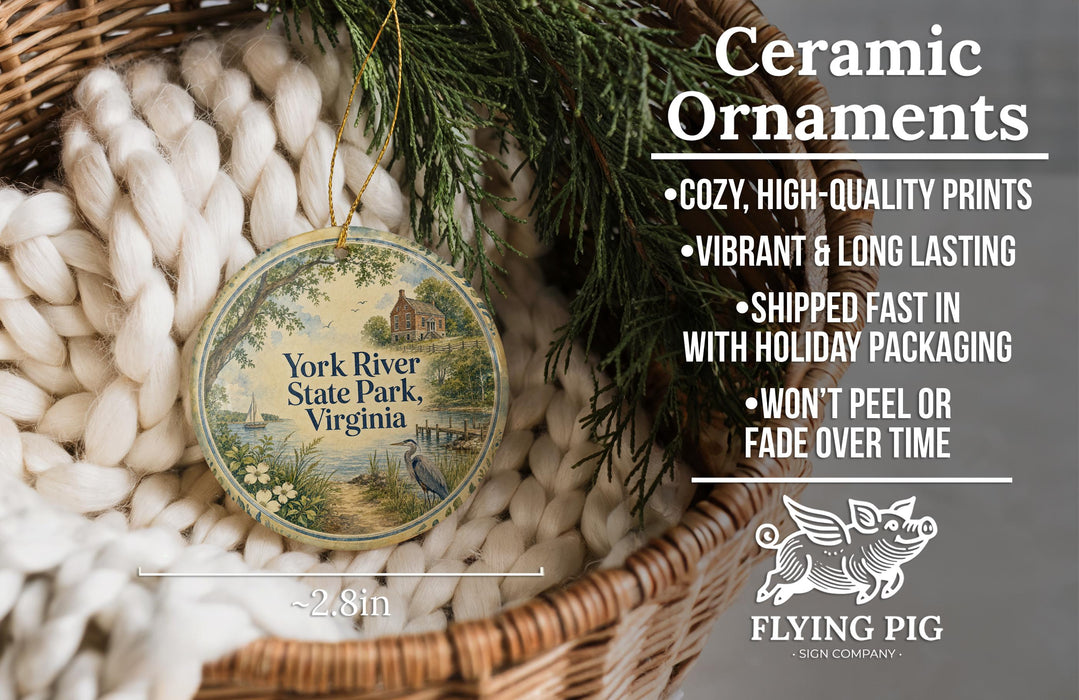 Ceramic ornaments, including a round ornament with a scenic image of York River State Park, Virginia, hanging in a woven basket.