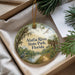 A decorative ornament with a scenic image of the Alafia River State Park in Florida, featuring a heron, palm trees, and a winding path.