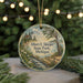 A round ornament with a lighthouse and a scenic landscape, featuring text that reads "Albert E. Sleeper State Park, Michigan".