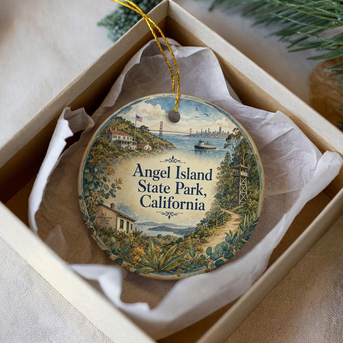 A decorative ornament in a box, featuring an illustration of Angel Island, State Park, and California.