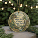 A circular ornament with a scenic image of the Apple River Canyon State Park in Illinois, surrounded by greenery and a string of lights.