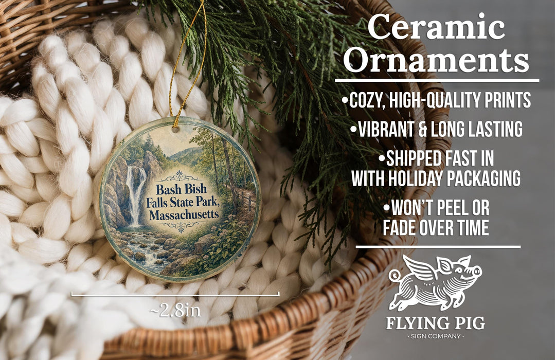 Ceramic ornaments, featuring a detailed image of a waterfall in a forest, are displayed in a basket. The text highlights the ornaments as "Ceramic Ornaments" and mentions their features such as "Cozy, high-quality prints", "Vibrant & long lasting", "Shipped fast in with holiday packaging", and " Won't peel or fade over time". The image also includes a scale indicating the size of the ornaments, with the text "2.8in" and the logo of