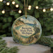A round ornament with a scenic landscape of Benzie State Park, Michigan, featuring a path leading to a body of water surrounded by trees and greenery.