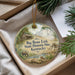 A decorative ornament with a painting of a historical site, specifically the Big Bone Lick State Historic Site in Kentucky, hanging from a string.