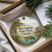 A decorative ornament in a box, featuring an illustration of Big Lagoon State Park in Florida, with a bird and a turtle in the water.