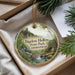 A round ornament with a scenic landscape of Bigelow Hollow State Park, Connecticut, featuring a waterfall and forest.