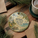 A decorative ornament featuring a lighthouse and beach scene, with the text "Bill Bagg's Cape Florida State Park, Florida" printed on it.
