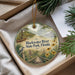 A decorative ornament with a scenic image of Blackwater River State Park, Florida, hanging from a string.