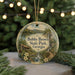 A round ornament with a scenic landscape of Bobby Brown State Park, Georgia, featuring a cabin, trees, and a waterfall.
