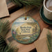 A round ornament with a scenic landscape of Border Field State Park, California, featuring a bird, a deer, and a body of water.