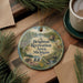 A round ornament with a scenic illustration of the Brighton Recreation Area in Michigan, featuring a lake, park, and bridge.
